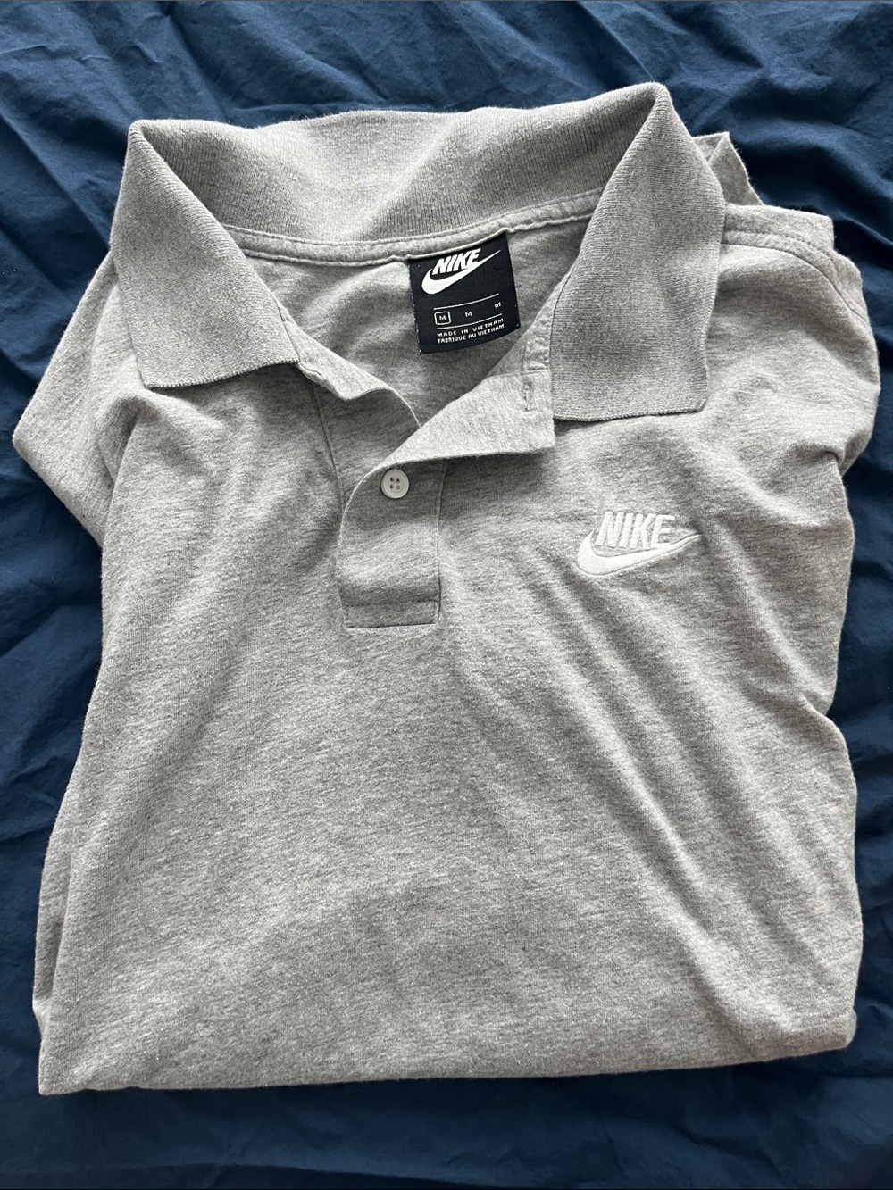 Nike Men’s Light Gray Polo Shirt with White Swoosh